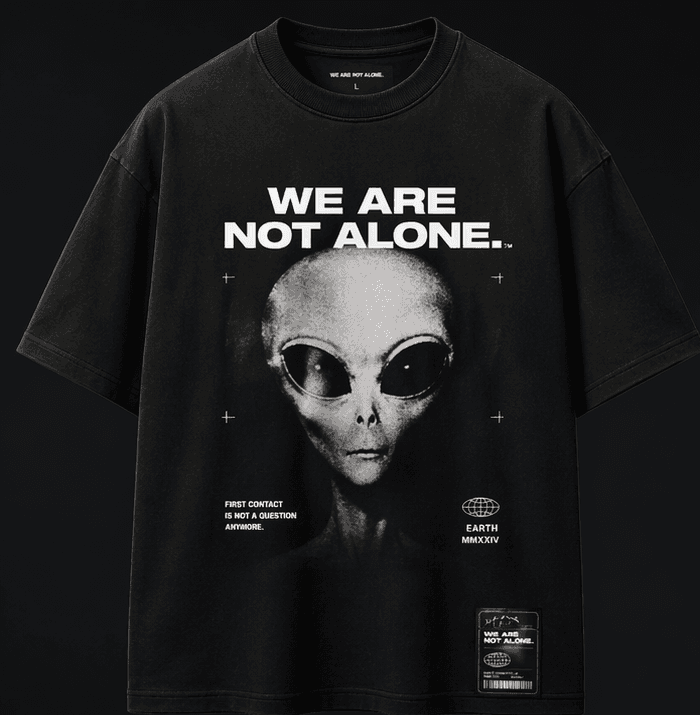 WE ARE NOT ALONE tee front
